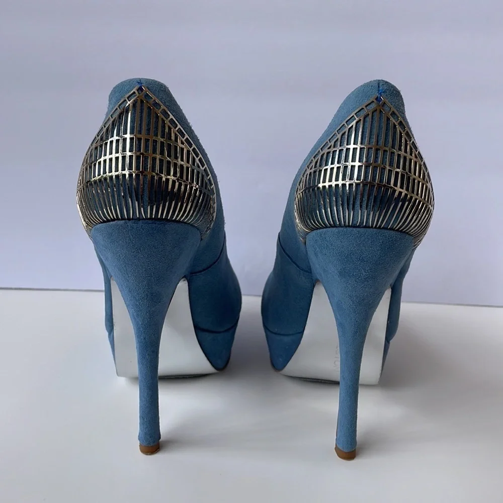 H BY HALSTON. Light blue stiletto heels with silver cage design in women’s sz 6